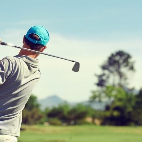 man golfing